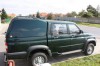 Nejvyšší krytou úložnou plochu z klasických off-roadů pickupů poskytuje hardtop Maxim I od firmy OM Canopies na UAZu. hardtop, uaz, off-road, pickup, om canopies